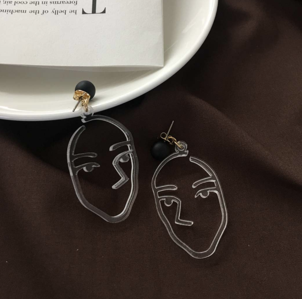 人臉造型飾品，透明耳環